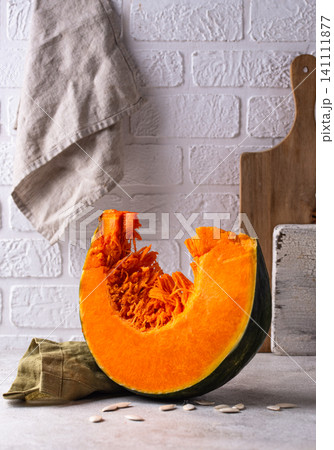 Raw sliced pumpkin with seed Raw sliced pumpkin with seed 141111877