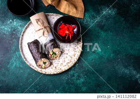 Trendy viral sushi burrito or shawarma 141112082
