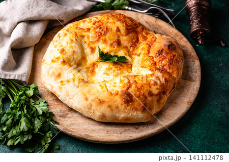 Khachapuri with cheese, Georgian cuisine Khachapuri with cheese, Georgian cuisine 141112478