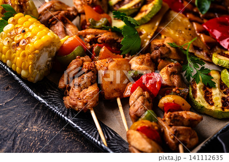 Assortment of grilled bbq meat and vegetables Assortment of grilled bbq meat and vegetables 141112635