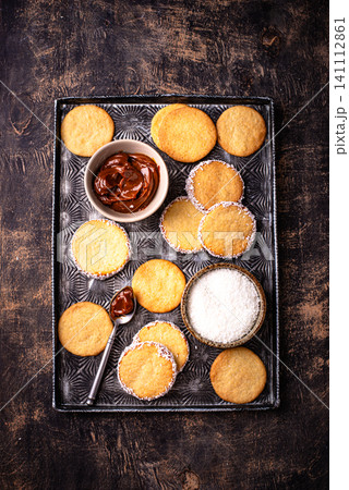 Alfajores, traditional Spanish sandwich cookies Alfajores, traditional Spanish sandwich cookies 141112861