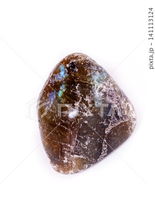 Macro mineral stone Labradorite on white background 141113124
