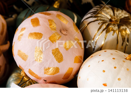 beautiful painted pumpkins of white and gold color on halloween beautiful painted pumpkins of white and gold color on halloween 141113138