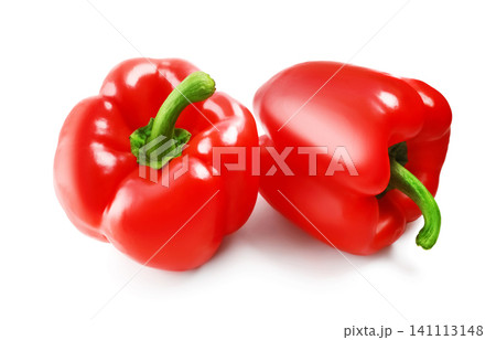 two fresh red bell pepper vegetables are isolated on a white background. This ripe, sweet, and healthy food is perfect for cooking and diet projects. 141113148