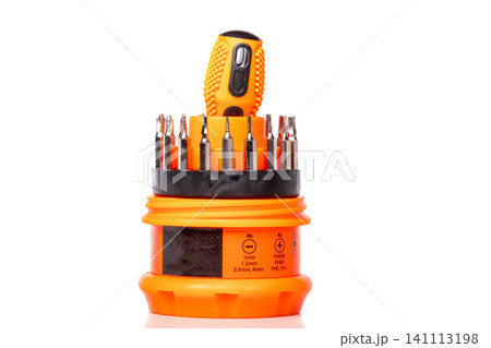 A set of different attachments for a head screwdriver with a screwdriver on a white background A set of different attachments for a head screwdriver with a screwdriver on a white background 141113198