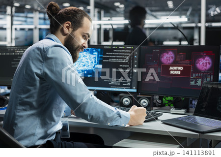 Frustrated server room programmer smashing desk, upset by faulty equipment while working with AI. 141113891