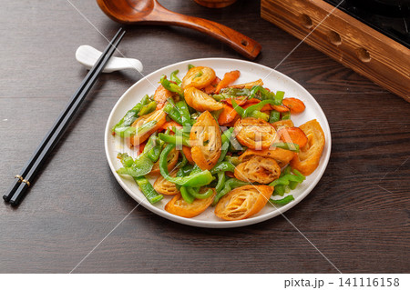 Stir Fried Gluten Rolls with Green Peppers Chinese Dish Stir Fried Gluten Rolls with Green Peppers Chinese Dish 141116158