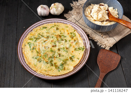coarse Grain Chinese Pancake with Tofu Pulp and Celery Leaves, Healthy Flatbread coarse Grain Chinese Pancake with Tofu Pulp and Celery Leaves, Healthy Flatbread 141116247