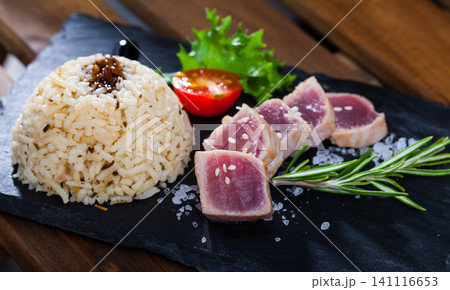 Tuna Tataki garnished with rice Tuna Tataki garnished with rice 141116653