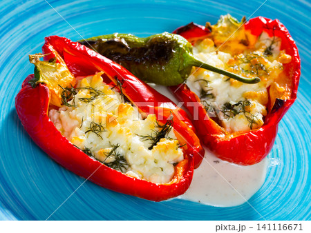 Appetizer sweet red peppers stuffed with soft cheese brynza Appetizer sweet red peppers stuffed with soft cheese brynza 141116671