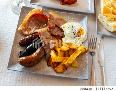 Fried pork with assorted Spanish sausages Fried pork with assorted Spanish sausages 141117292