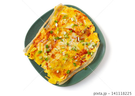 northeast Chinese street food grilled cold noodles with egg and scallions, isolated on white northeast Chinese street food grilled cold noodles with egg and scallions, isolated on white 141118225