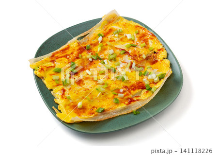 northeast Chinese street food grilled cold noodles with egg and scallions, isolated on white northeast Chinese street food grilled cold noodles with egg and scallions, isolated on white 141118226