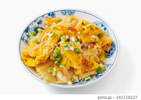 northeast Chinese street food grilled cold noodles with egg and scallions, isolated on white northeast Chinese street food grilled cold noodles with egg and scallions, isolated on white 141118227