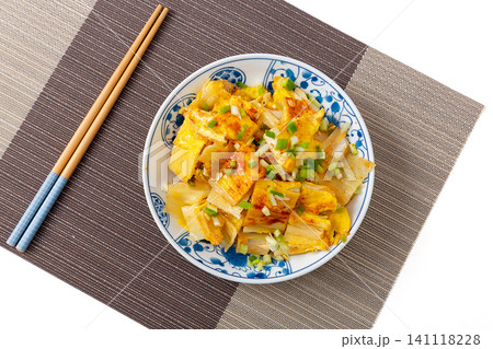 northeast Chinese street food grilled cold noodles with egg and scallions, isolated on white northeast Chinese street food grilled cold noodles with egg and scallions, isolated on white 141118228