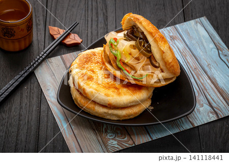 chinese Sesame Flatbread Sandwich with Kelp Traditional Street Food chinese Sesame Flatbread Sandwich with Kelp Traditional Street Food 141118441