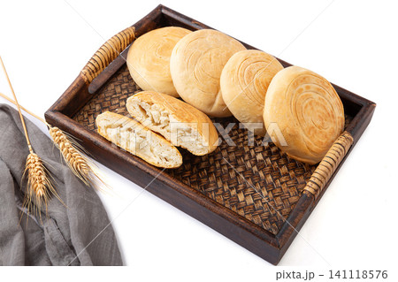 Traditional Shaanxi baijimo flatbread buns in bamboo basket for Chinese pork burger 141118576