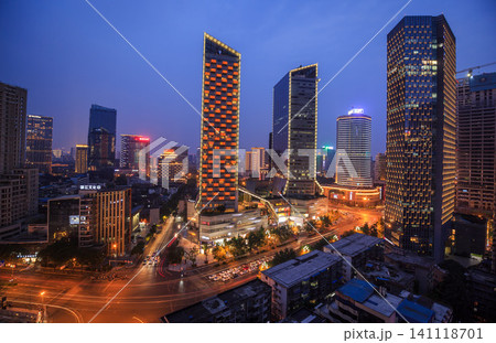Chengdu city skyline at night with illuminated skyscrapers and traffic Chengdu city skyline at night with illuminated skyscrapers and traffic 141118701