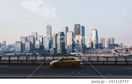 Chongqing city skyline with skyscrapers and a yellow taxi on a bridge Chongqing city skyline with skyscrapers and a yellow taxi on a bridge 141118737