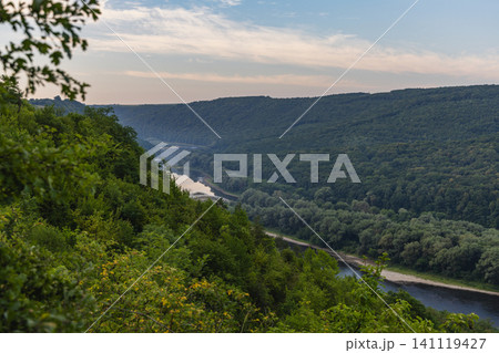 Canyon valley view of Dniester river in Ukraine with forest and hills Canyon valley view of Dniester river in Ukraine with forest and hills 141119427