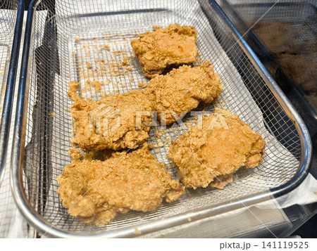 Fried chicken on a grill Fried chicken on a grill 141119525