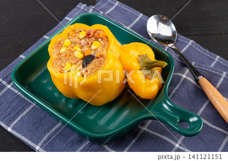 healthy delicious stuffed sweet peppers with savory rice filling, close up. healthy delicious stuffed sweet peppers with savory rice filling, close up. 141121151