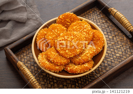 authentic Chinese Nanguabing, fried sticky rice pumpkin cakes with breadcrumbs. 141121219