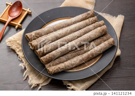 healthy Chinese buckwheat pancakes stack on plate, gluten free grain flatbread healthy Chinese buckwheat pancakes stack on plate, gluten free grain flatbread 141121234