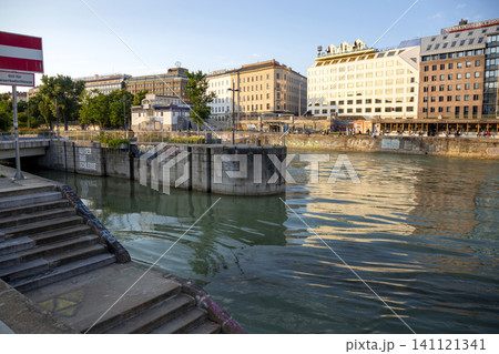 Vienna, Austria - June 13, 2023: Embankment the Danube Canal in Vienna Vienna, Austria - June 13, 2023: Embankment the Danube Canal in Vienna 141121341