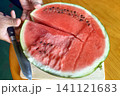 delicious watermelon cut in half 141121683