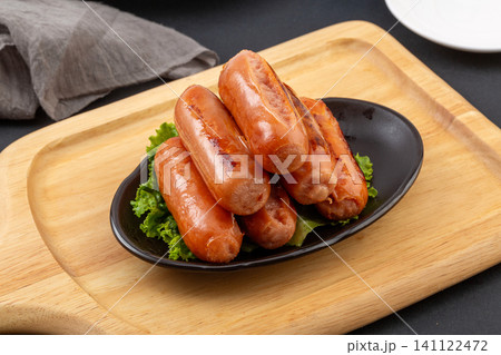 grilled Taiwanese Style Premium Pork Sausages on Plate with Wooden Board grilled Taiwanese Style Premium Pork Sausages on Plate with Wooden Board 141122472