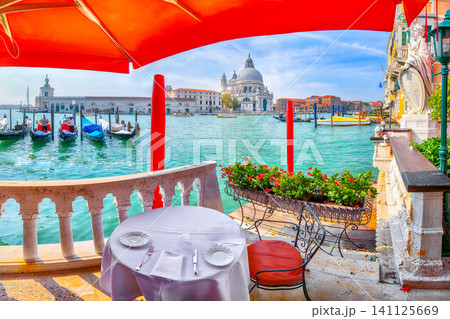 Remarkable morning cityscape of Venice with famous Canal Grande and Basilica di Santa Maria della Salute church. Remarkable morning cityscape of Venice with famous Canal Grande and Basilica di Santa Maria della Salute church. 141125669