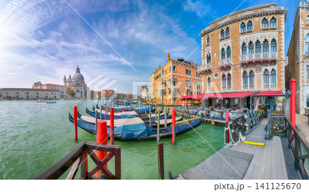 Remarkable morning cityscape of Venice with famous Canal Grande and Basilica di Santa Maria della Salute church. Remarkable morning cityscape of Venice with famous Canal Grande and Basilica di Santa Maria della Salute church. 141125670