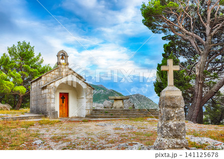 Amazing old baroque church above the mouth of the river Cetina near Omis. Amazing old baroque church above the mouth of the river Cetina near Omis. 141125678