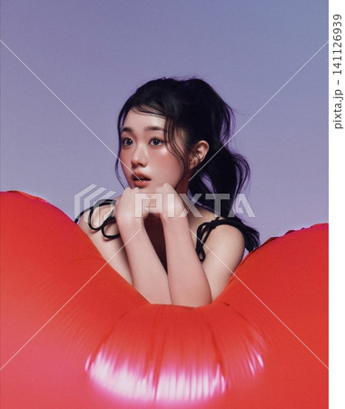 Beautiful Young Asian Woman with Natural Healthy Glowing Skin and Smooth Black Hair, Fresh Beauty Portrait on Clean Background Beautiful Young Asian Woman with Natural Healthy Glowing Skin and Smooth Black Hair, Fresh Beauty Portrait on Clean Background 141126939