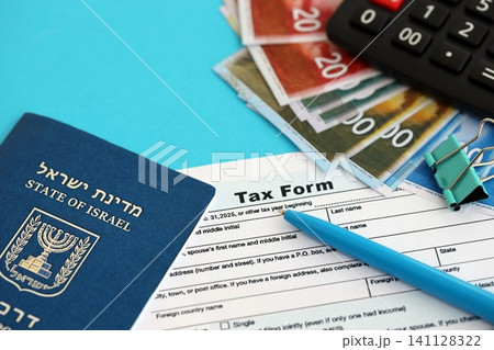 Israel new shekels money with passport and tax form on flag. The current Israel money and blank Israel new shekels money with passport and tax form on flag. The current Israel money and blank 141128322