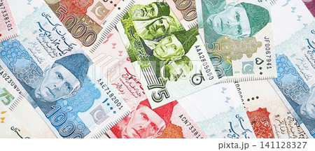 Pakistan rupees banknotes. The current Pakistan money bills lies on table in big amount 141128327