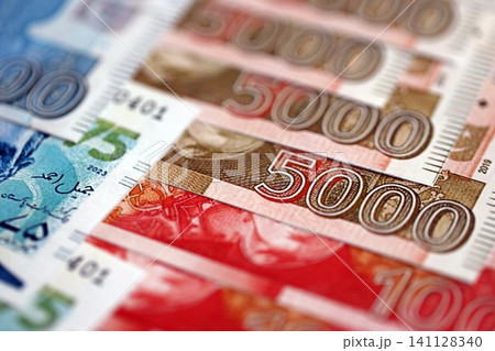Pakistan rupees banknotes close up. The current Pakistan money bills lies on table in big amount 141128340