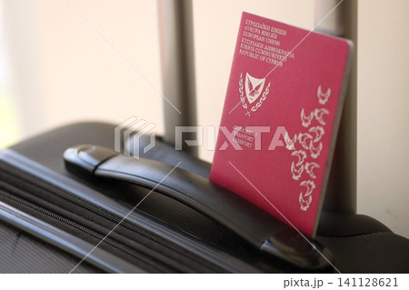 Kyprus passport on touristic baggage luggage in airport. Travel and tourism in Europe concept 141128621