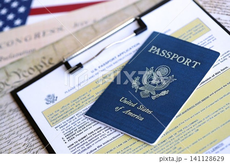 Department of State form DS11 Application for a U.S. Passport lies on table and ready to fill 141128629
