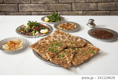 Turkish Pide - Konya Etli Ekmek Kebab with Minced Meat. Turkish Pide - Konya Etli Ekmek Kebab with Minced Meat. 141129626