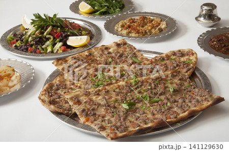 Turkish Pide - Konya Etli Ekmek Kebab with Minced Meat. Turkish Pide - Konya Etli Ekmek Kebab with Minced Meat. 141129630