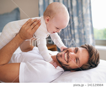 Father, laughing and baby girl on bed for bonding, love and playing together in bedroom. Happiness, playful man and daughter for childhood development, parenting and morning fun in apartment Father, laughing and baby girl on bed for bonding, love and playing together in bedroom. Happiness, playful man and daughter for childhood development, parenting and morning fun in apartment 141129984