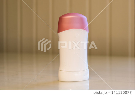 White blank roll on deodorant and lip balm tube, mock up template. Deodorant stick container. Bath concept. Place for text. Everyday cosmetic product. Antiperspirant jar. Personal hygiene, self care White blank roll on deodorant and lip balm tube, mock up template. Deodorant stick container. Bath concept. Place for text. Everyday cosmetic product. Antiperspirant jar. Personal hygiene, self care 141130077