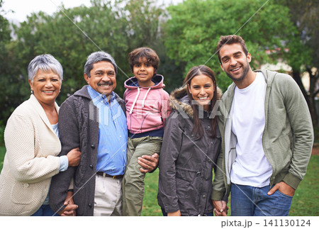 Portrait, smile and big family in nature outdoor for bonding, relationship and holding hands at backyard. Face, park and child with parents, grandparents and mom with interracial father in garden Portrait, smile and big family in nature outdoor for bonding, relationship and holding hands at backyard. Face, park and child with parents, grandparents and mom with interracial father in garden 141130124
