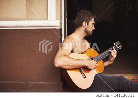 Guy, guitar or play of music to relax, thinking or planning of creative, vision or idea as dream sound. Man, performance or musical instrument as talent, note or inspiration for acoustic weekend Guy, guitar or play of music to relax, thinking or planning of creative, vision or idea as dream sound. Man, performance or musical instrument as talent, note or inspiration for acoustic weekend 141130315