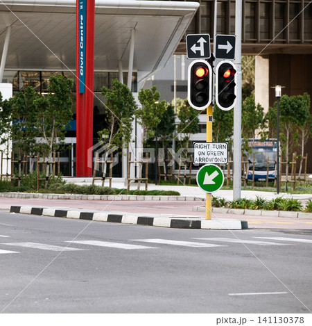 Road sign, traffic light and city with arrow for direction with travel information, typo or mistake for humor. Street, urban or metro buildings at bus stop, location and public transport in Cape Town Road sign, traffic light and city with arrow for direction with travel information, typo or mistake for humor. Street, urban or metro buildings at bus stop, location and public transport in Cape Town 141130378