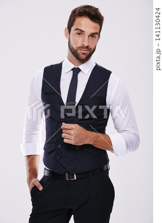 Man, fashion and portrait in studio with tuxedo or suit and isolated for trendy, style and classy. Young person, smile and handsome for formal clothes with shirt and tie for designer wear and alone Man, fashion and portrait in studio with tuxedo or suit and isolated for trendy, style and classy. Young person, smile and handsome for formal clothes with shirt and tie for designer wear and alone 141130424
