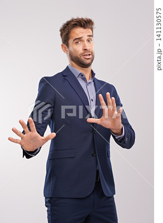 Businessman, hand gesture and studio to refuse or decline business offer with concern on white background. Portrait entrepreneur and reject with move away to deny accusations as corporate person. Businessman, hand gesture and studio to refuse or decline business offer with concern on white background. Portrait entrepreneur and reject with move away to deny accusations as corporate person. 141130575