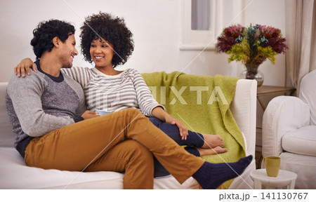 Couple, couch and hug for care and love in home, smile and proud of marriage and commitment. Happy people, affection and embrace on sofa in living room on weekend, support and trust in relationship 141130767